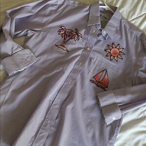 Stylish Purple Button-Down Shirt with Graphic Designs
